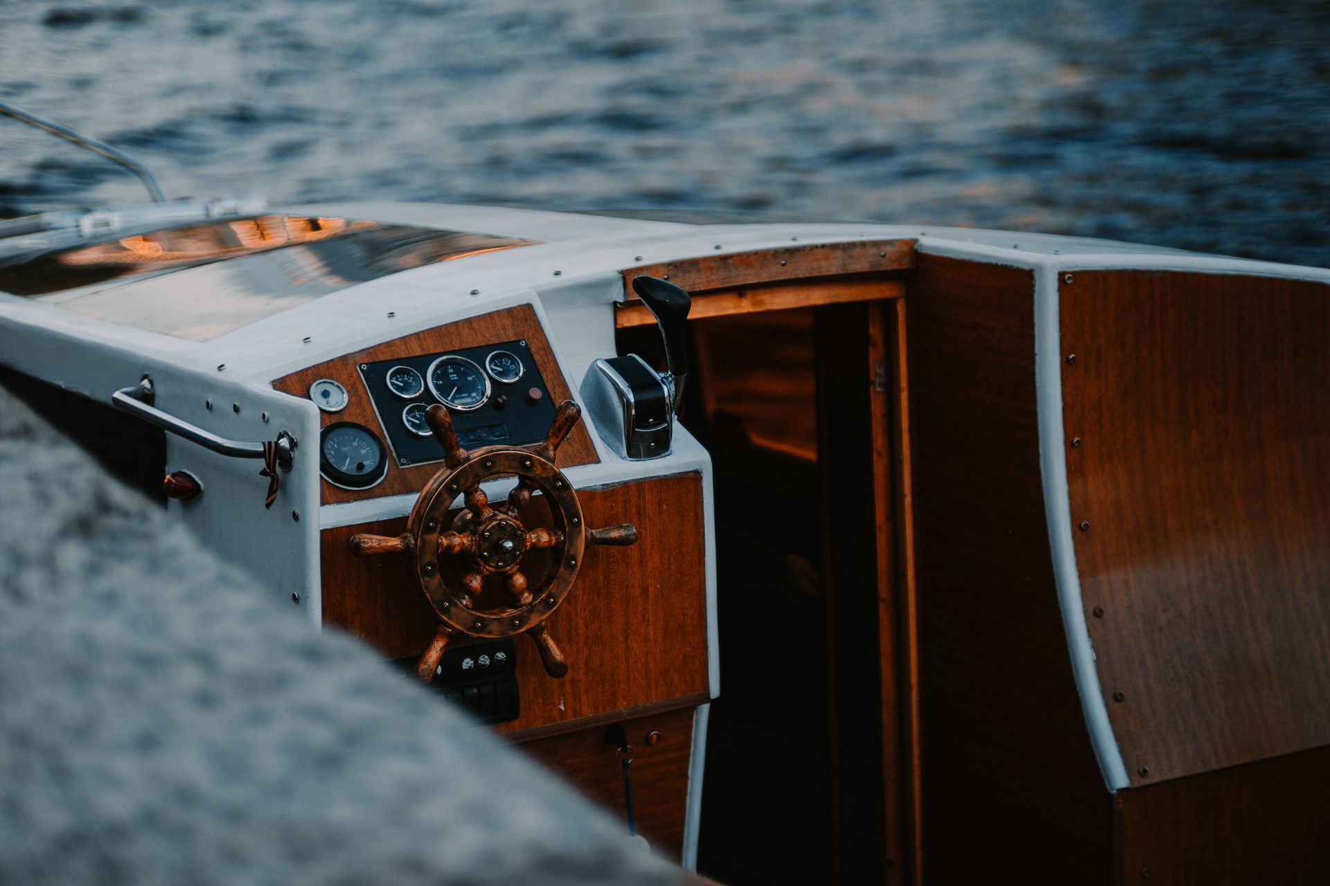 Compact cabin cruiser moored on a canal
